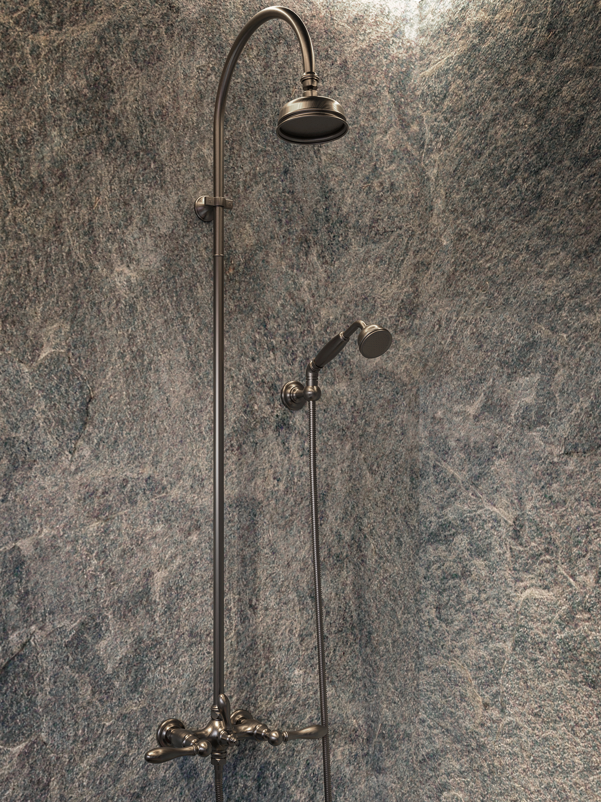 Colonne de douche Lyre en laiton bronze vieilli sur paroi en pierre ardoisée.