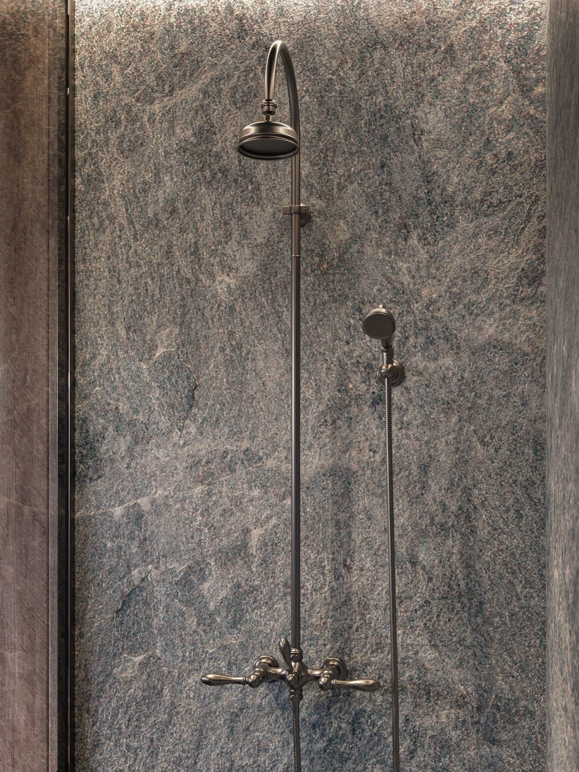 Colonne de douche Lyre en laiton bronze vieilli sur paroi en pierre ardoisée.