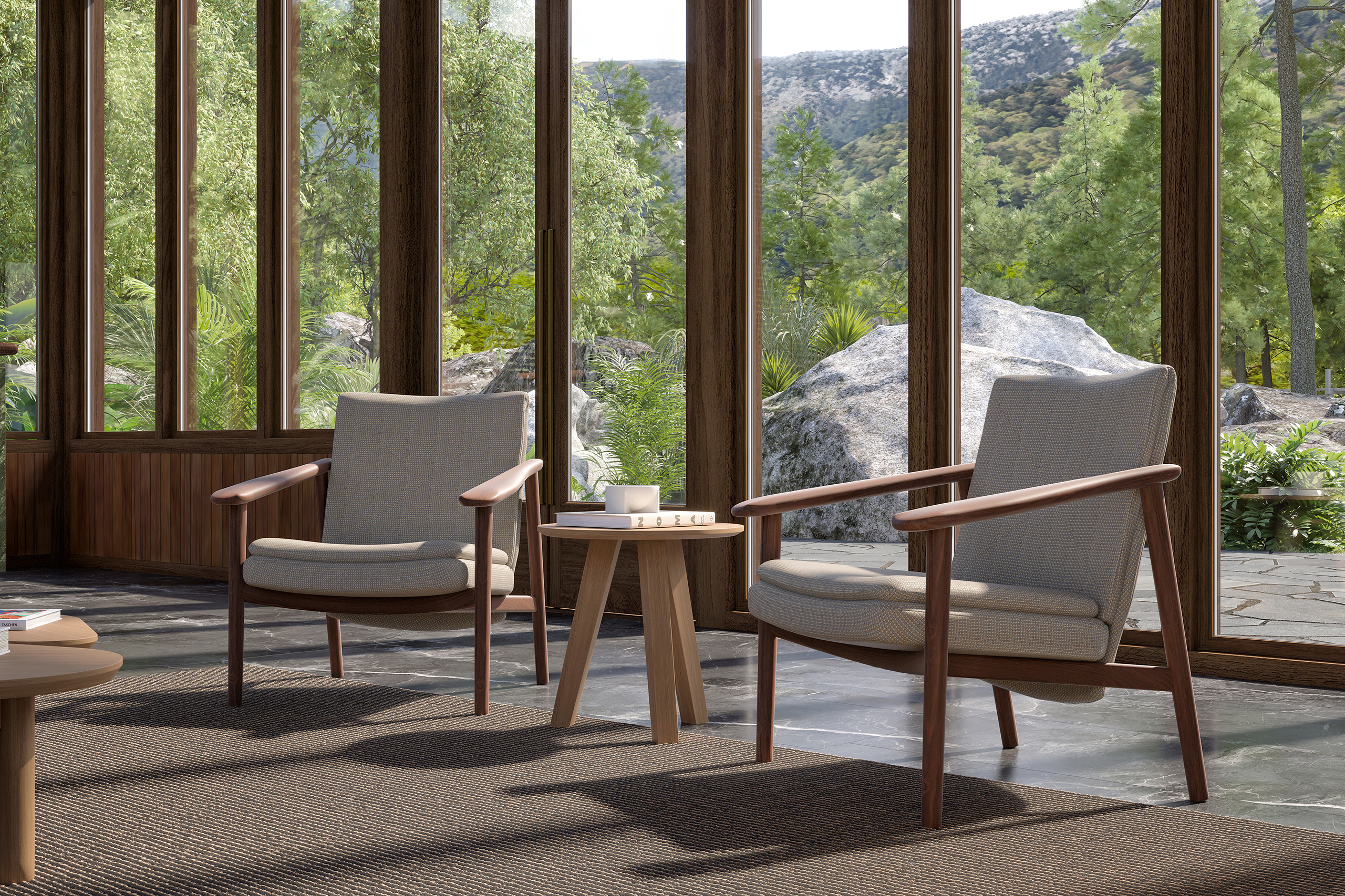 Bosc – salon vitré double hauteur en bois, grande baie sur forêt et montagne, canapé crème coussins verts, tables basses Escamp en chêne