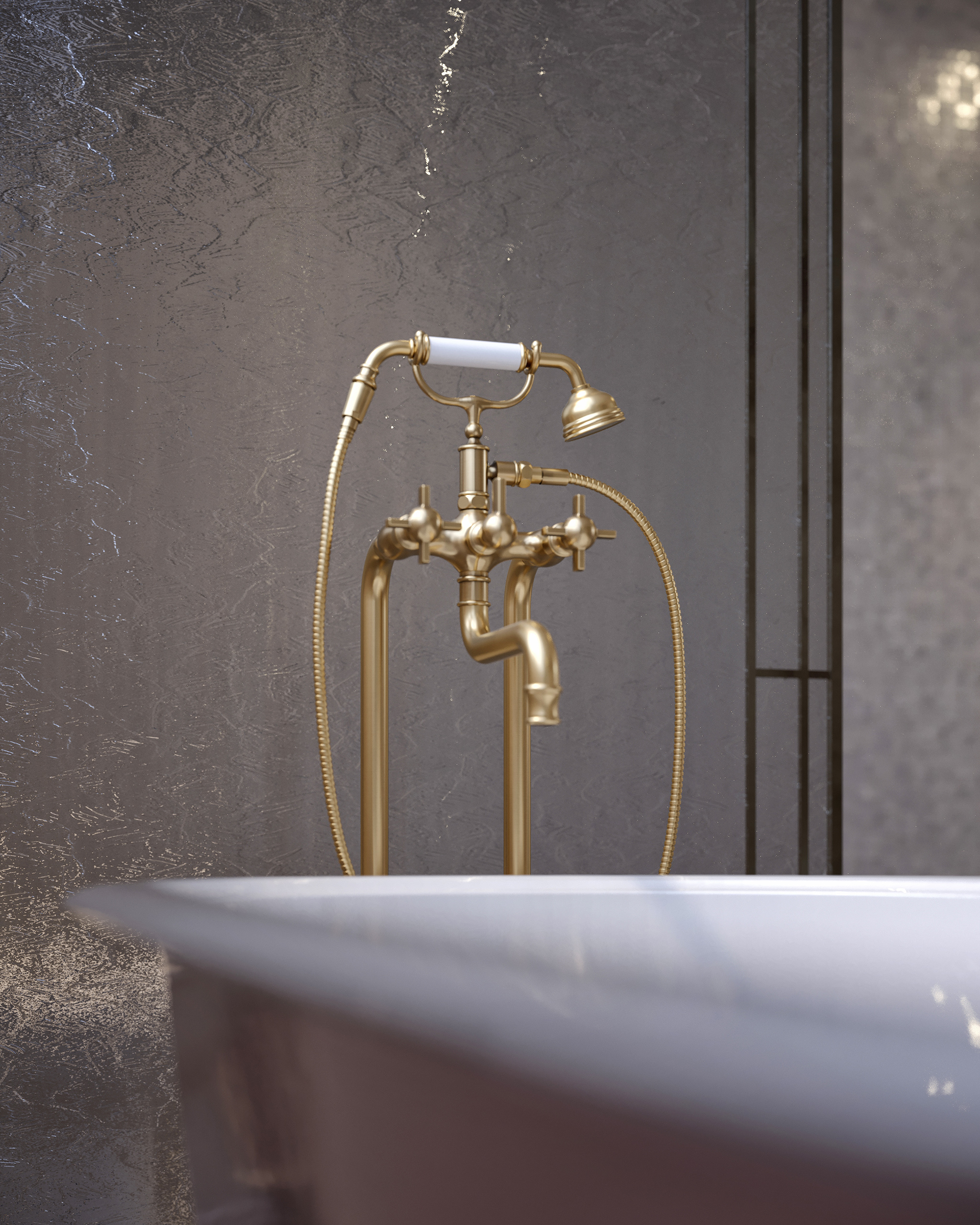 Gros plan sur la colonne de bain îlot Heritage Volevatch en laiton doré brossé, poignée céramique blanche et douchette, sur baignoire rose.