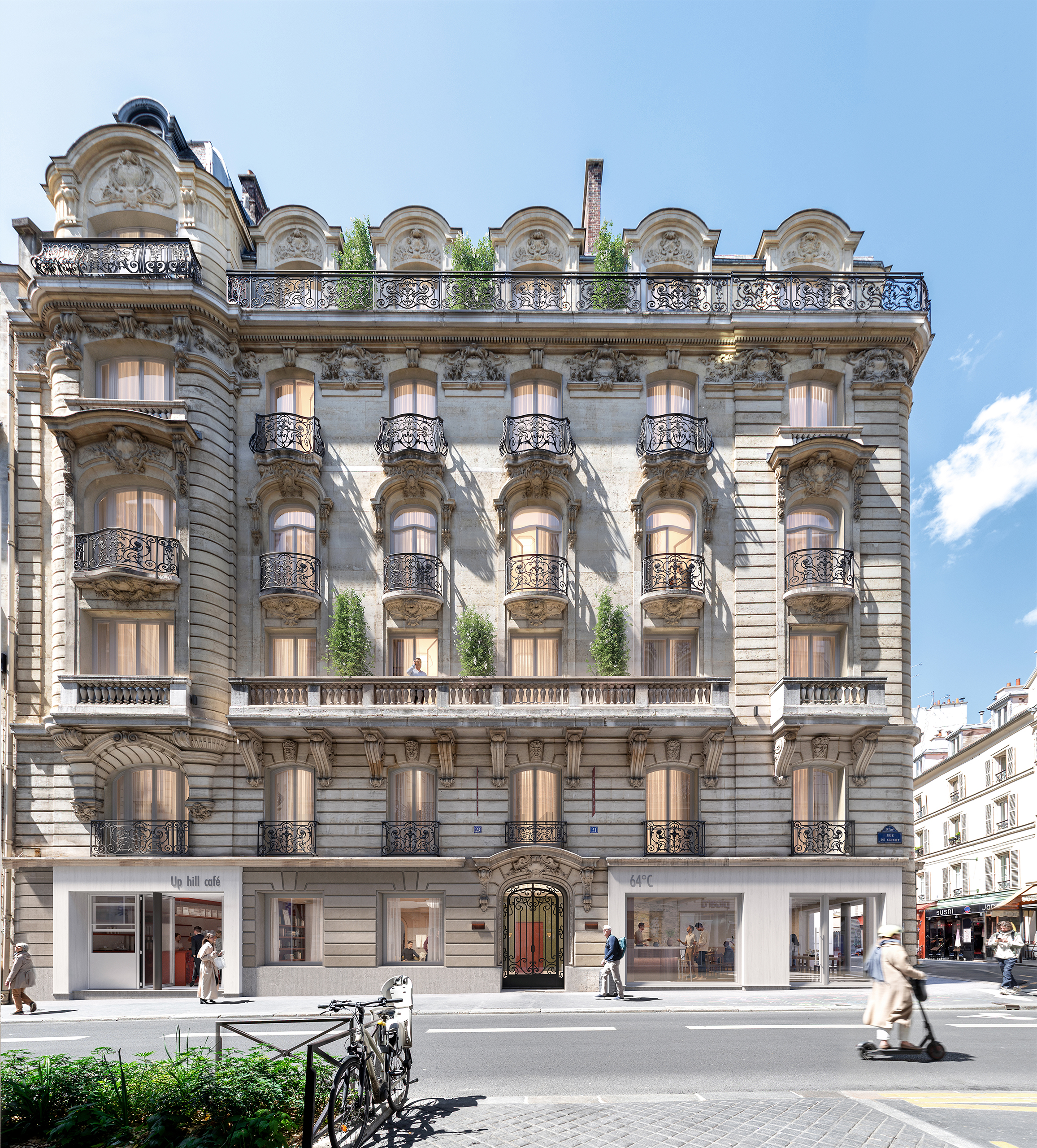 29 Clichy – immeuble haussmannien en pierre de taille à l'angle d'une rue parisienne animée, rez-de-chaussée vitré, ciel bleu.