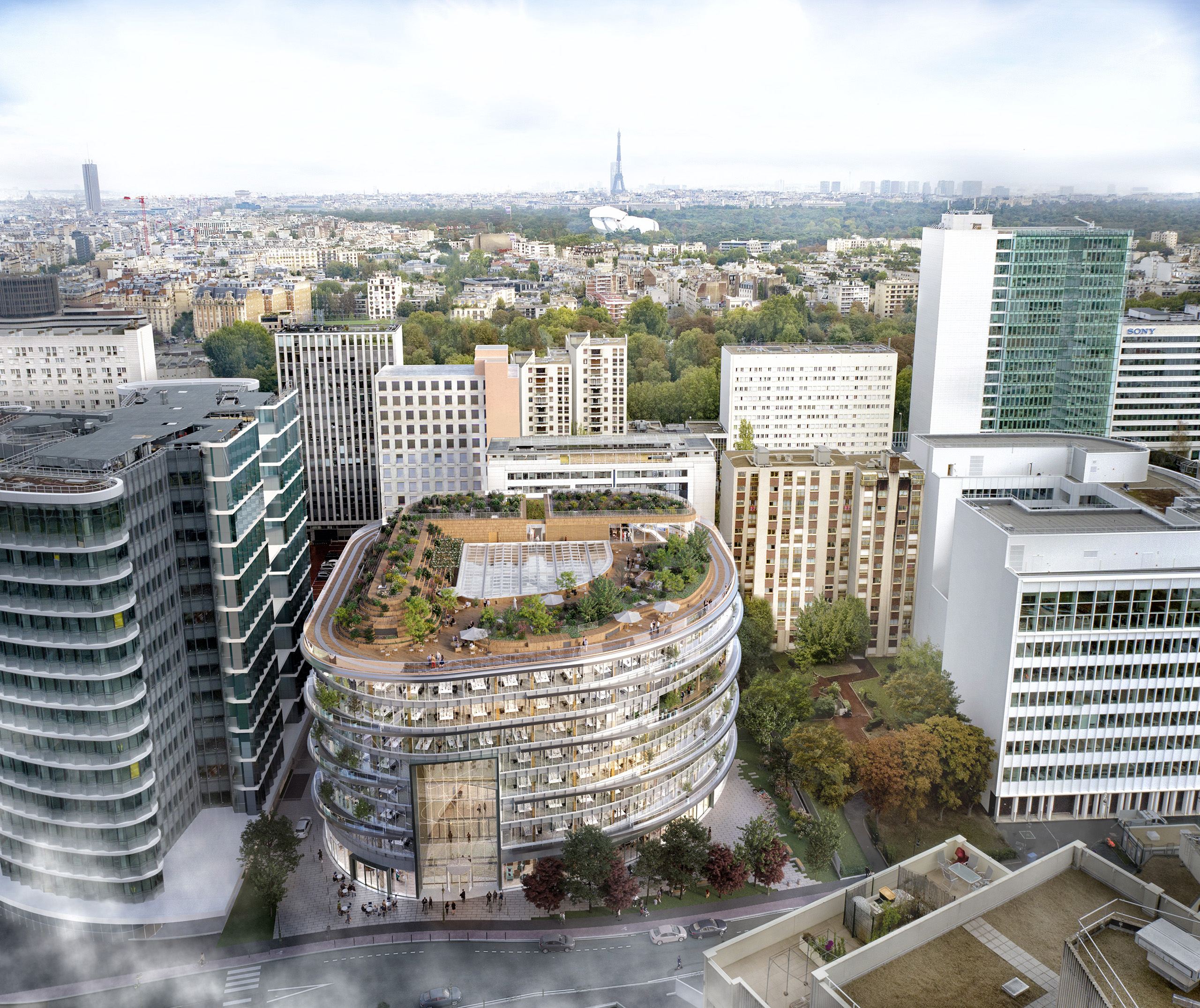 Vue aérienne du BNP Tour Inspire, La Défense – toiture-jardin suspendue avec vue sur la Tour Eiffel et le Bois de Boulogne.
