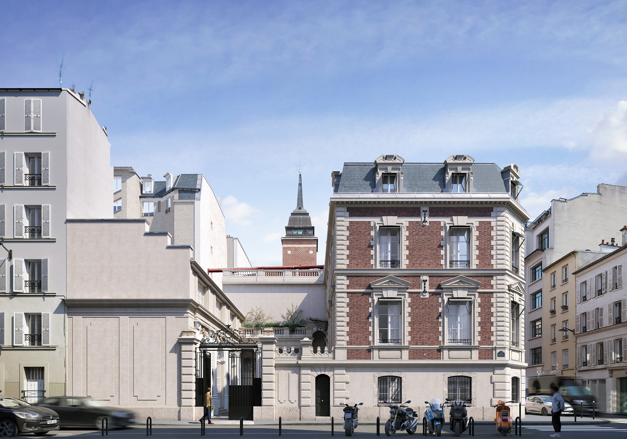 Jost – immeuble en briques rouges et pierre de taille à l'angle d'une rue parisienne, toiture mansardée, ciel bleu