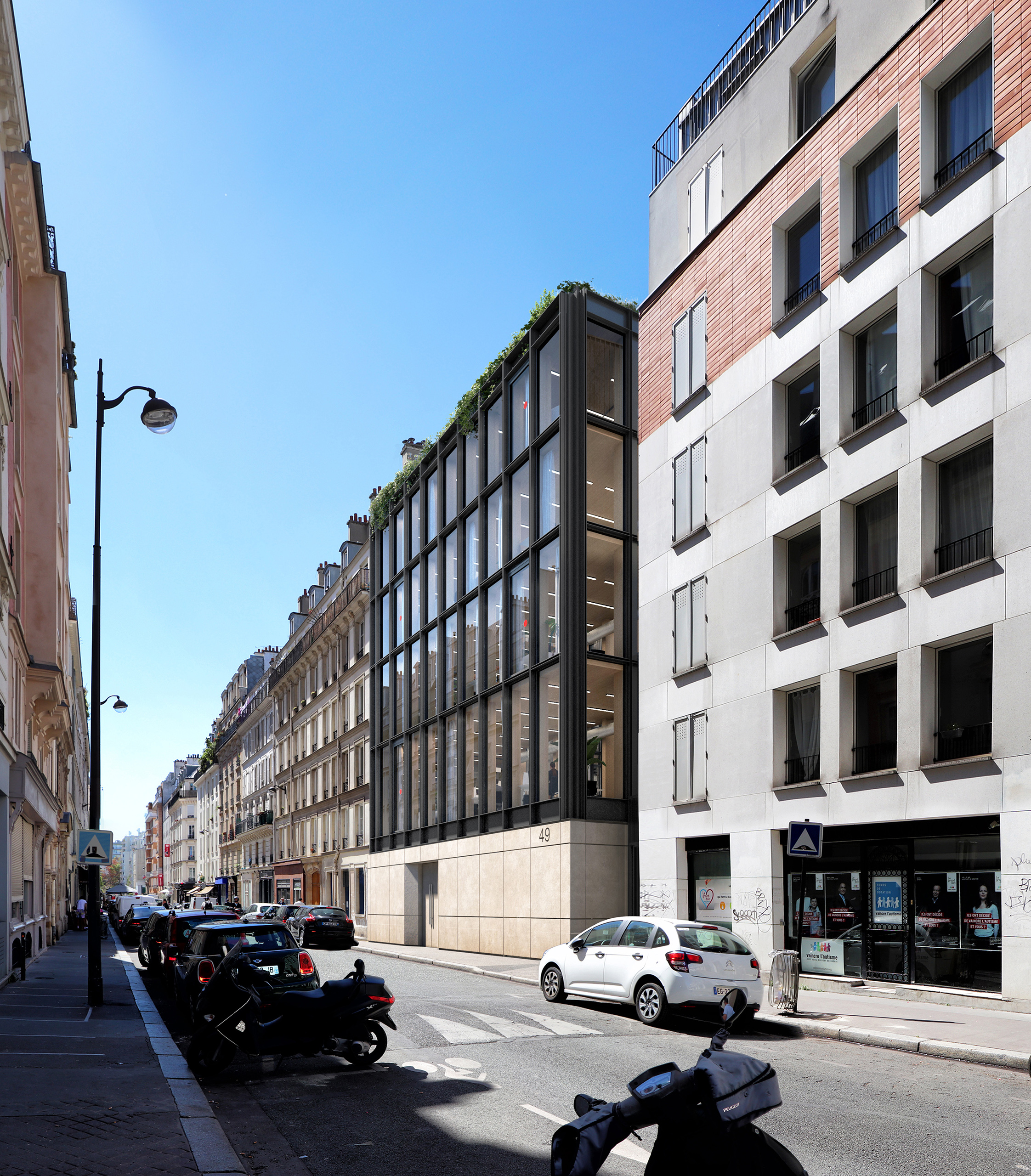 Immeuble de bureaux Rue Servan Paris – façade entièrement vitrée à structure noire sur socle en pierre, toiture végétalisée, insertion contemporaine dans tissu haussmannien