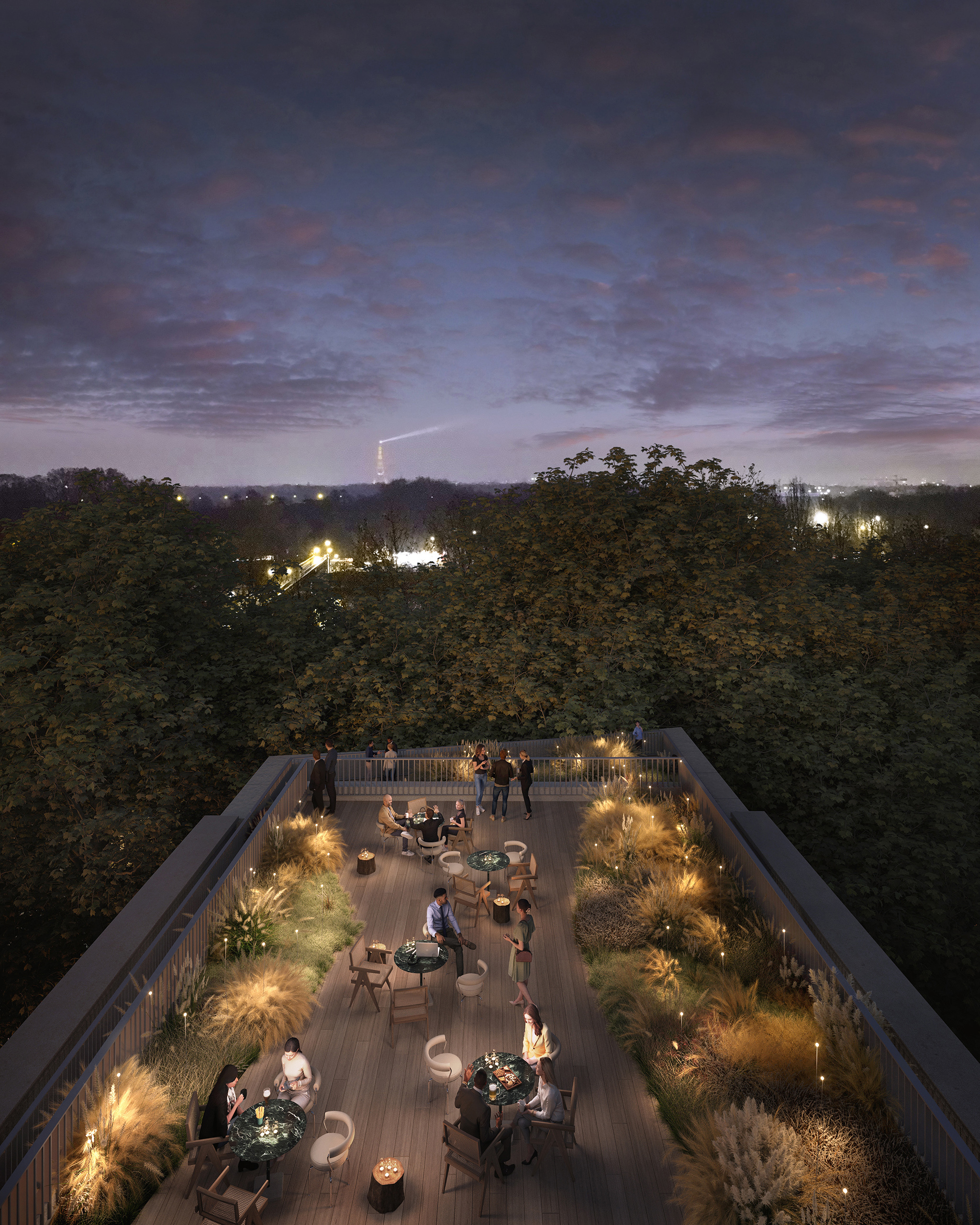 Rooftop de nuit du projet Saint-Cloud Campus – terrasse en bois avec graminées éclairées, vue sur la Tour Eiffel et le Bois de Boulogne au crépuscule