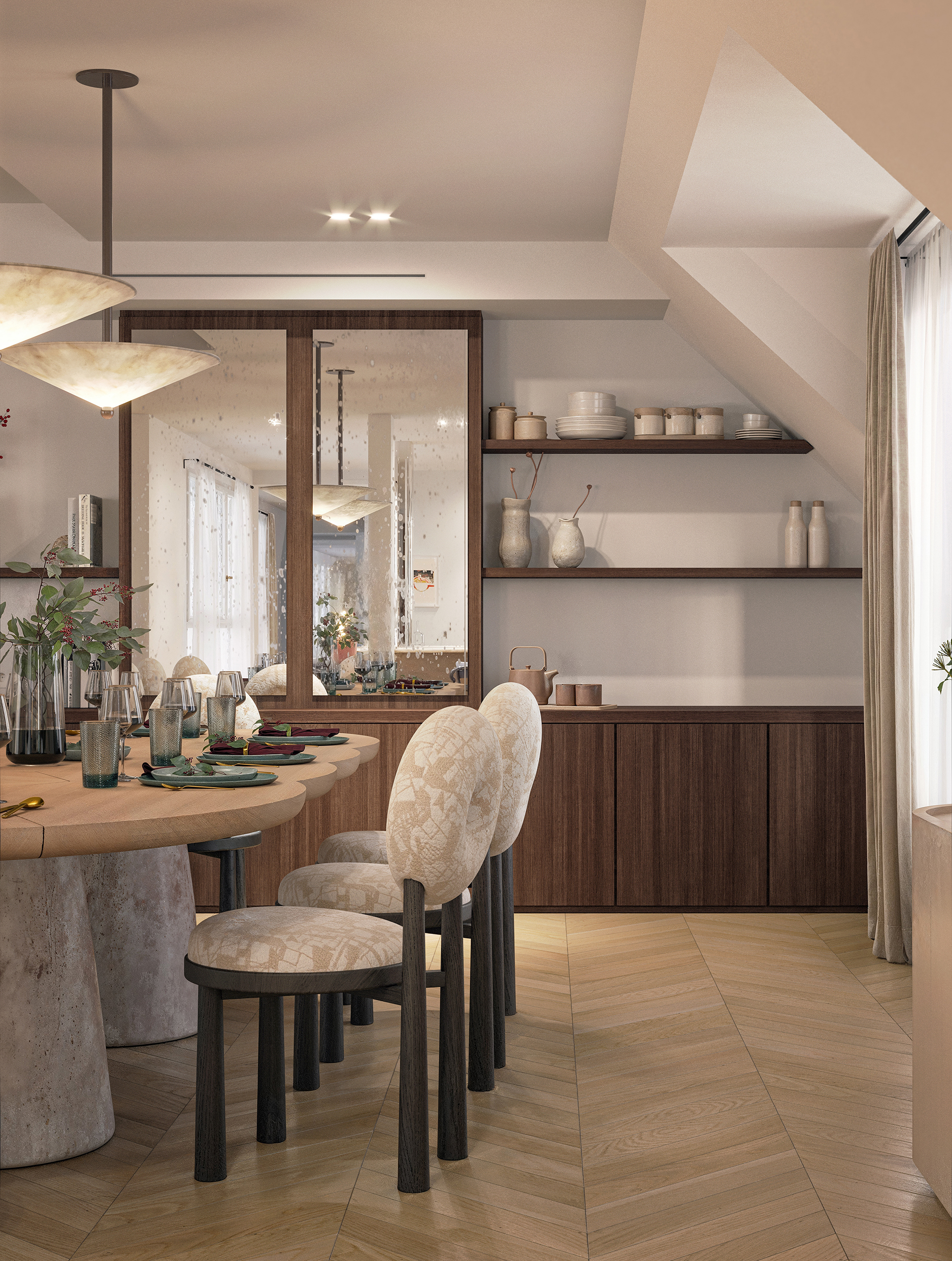 Signature – salle à manger avec chaises rondes en tissu crème, table en bois, suspension en pierre, étagères en noyer, parquet en chevrons.