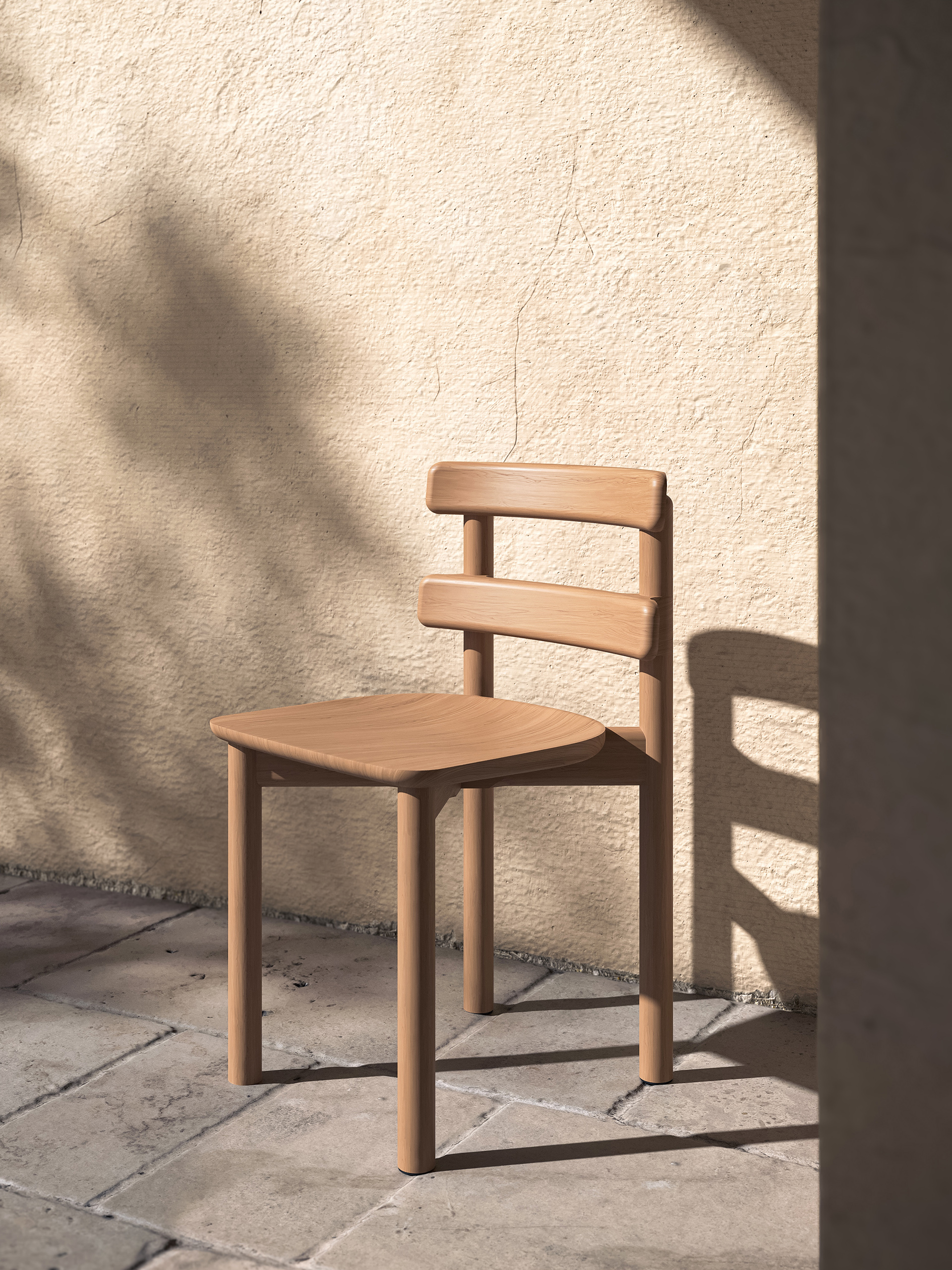 Chaise Sista en bois naturel, design Ionna Vautrin pour BOSC – vue de détail en lumière naturelle sur terrasse en pierre
